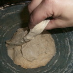 Fold the dough over itself after you've given it a stretch.